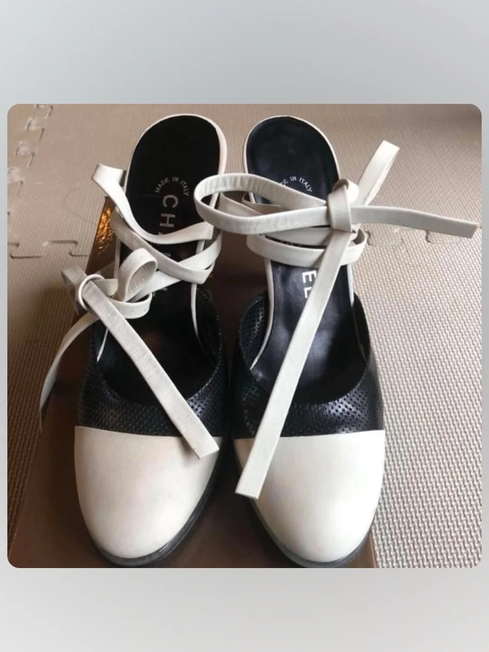 CHANEL Two-Tone Cream and Black Perforated Slingback Mules